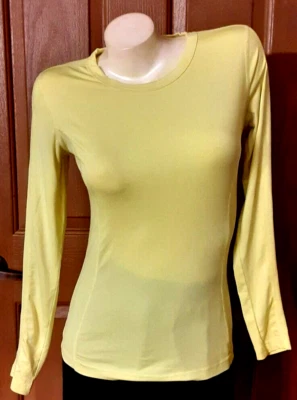 Camiseta Danskin Now Fitted Amarilla Manga Larga Cuello Redondo Misses Talla XS (0-2) Foto 1 de 4