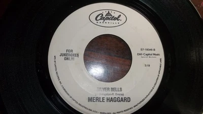 merle haggard 45 record  christmas harder 1 to find/very good - Image 1 of 2