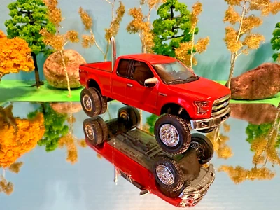 1/64 Custom Lifted 2017 Ford F150, Rear Pipe, Extended Cab, G5 Lift Greenlight - Image 1 of 3