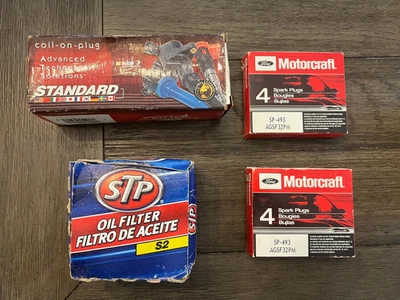 1998-2011 LINCOLN TOWN CAR 8 Spark Plug, 1 ignition coil, STP s2 oil filter lot - Image 1 of 4