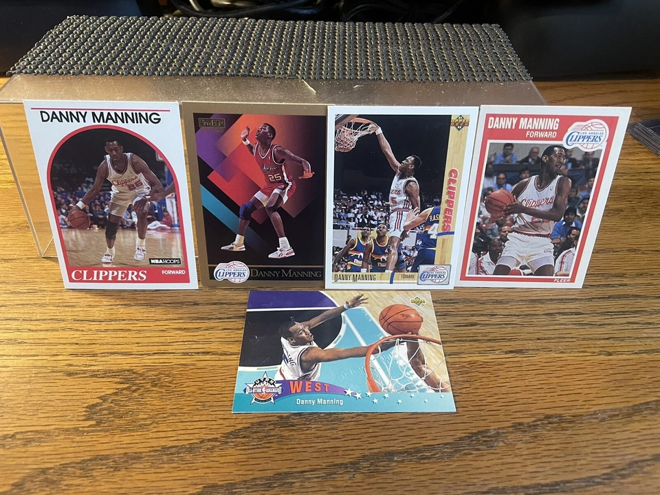 Skybox Basketball Danny Manning #129 Clippers 1990-91 + 4 sin precio base MT. Foto 1 de 4