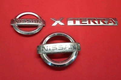 2005-2008 Nissan Xterra Badge Emblem Set Kit Chrome OEM - Image 1 of 4