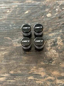 4 Piece Set Of Black Tyre Valve Caps For Aston Martin DB7 Vantage Volante - Picture 1 of 3