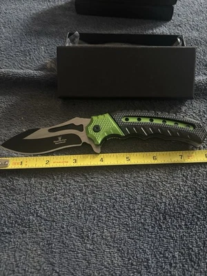 Cuchillo plegable táctico ojo de serpiente Foto 1 de 4