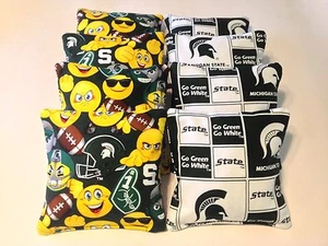 JUEGO DE 8 BOLSAS DE FRIJOLES CORNHOLE MICHIGAN SPARTANS con EMOJI - Imagen 1 de 1