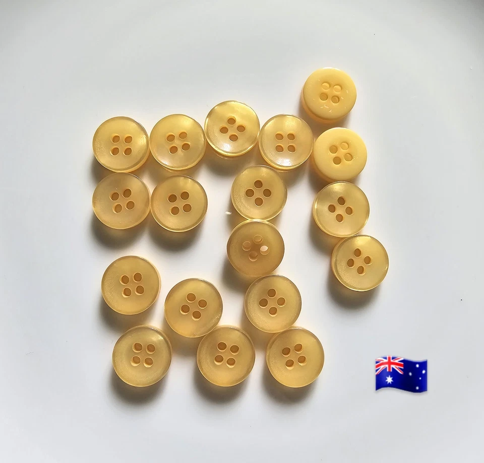 Botones acrílicos brillantes de 4 agujeros ojo de gato ámbar de 12 mm 25 un. Foto 1 de 1