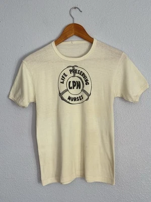 Camiseta Babydoll Enfermera Preservadora de Vida Años 70 Disco Glam M De Colección Foto 1 de 4