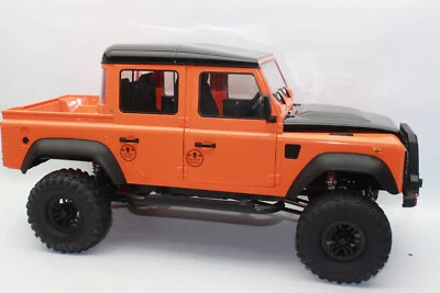 Double E FM102 PICKUP orange Landrover Defender Crawler 4WD RTR 1:8 RC NEU - Bild 1 von 4