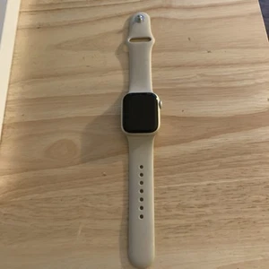 Apple Watch (GPS + LTE) Series 7 41MM Stainless Steel Case Starlight Sport Band - Photo 1 sur 8