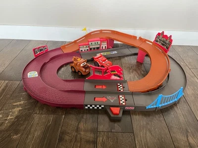 Disney Pixar Cars 2 Shake N Go World Grand Prix Race Track + 2 Vehicles McQueen - Image 1 of 4