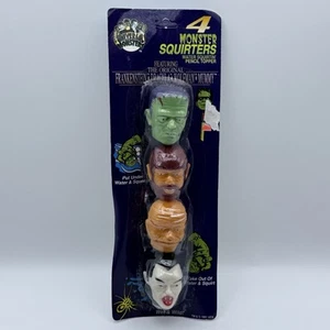 VINTAGE UNIVERSAL STUDIOS 4 MONSTER SQUIRTERS WASSER SPRITZENDER BLEISTIFTAUFLEGER - Bild 1 von 7