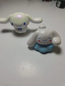 Lot Of 2 cinnamoroll Sanrio figurines  1 Diecast (Standing) 1 Plastic (sleeping) - Picture 1 of 13