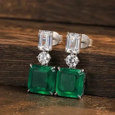 4 Ct Emerald Cut Simulated Green Emerald Drop Earrings In 14k White Gold Plated - Image 1 of 4