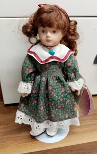Russ Porcelain Christmas Doll of the Month Birthday December 6" doll tag & Stand - Picture 1 of 3