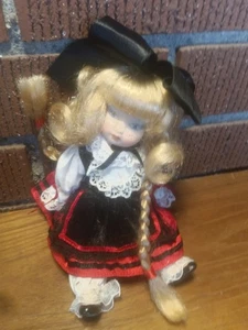 vintage 7” porcelain doll with big bow and braids - Picture 1 of 3