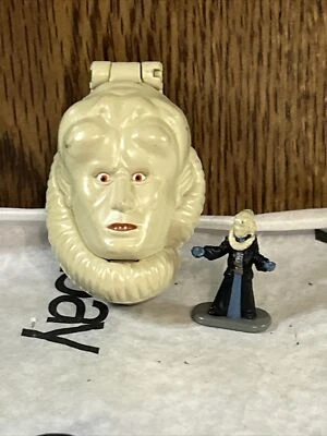 Mini juego facial de bolsillo Galoob Micro Machines 1996 babero Fortuna con figura Foto 1 de 4