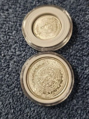Two Aztec Calendar Silver Rounds, 1/10 oz & 1/4 oz , BU, with capsules - Image 1 of 4
