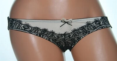 Braguita de bikini negra y beige con diseño de encaje transparente frontal y 2 lazos talla 10/12 Foto 1 de 2