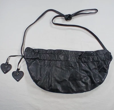 Bandolera Aldo de piel negra con interior morado y bolsillo con cremallera Foto 1 de 4