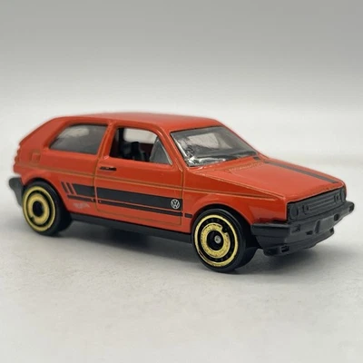 VW Golf naranja suelto 2023 exclusivo paquete múltiple Hot Wheels Foto 1 de 4