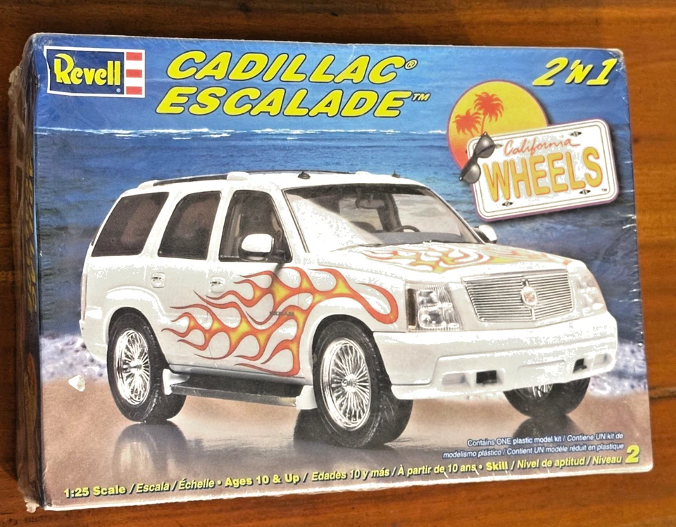 Novo Kit Modelo Selado Revell California Wheels Cadillac Escalade 1/25 2n1 85-2881 - Imagem 1 de 1
