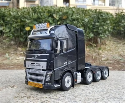 Tractor Volvo Fh16 8X4 acabado escala 1/32 modelos Marge negro plataforma transporte  - Imagen 1 de 4