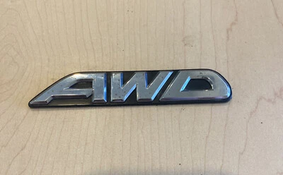 SUBARU OUTBACK AWD REAR HATCH EMBLEM OEM "AWD" TRUNK DECKLID LIFTGATE GATE GOLD - Image 1 of 2