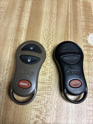 PAIR OEM 1999-2004 JEEP GRAND CHEROKEE KEYLESS REMOTE FOB GQ43VT9T - Image 1 of 2