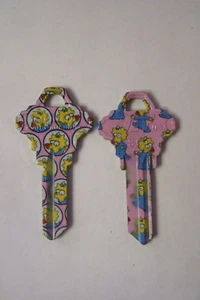 The Simpsons Baby Maggie Schlage SC1 house key blanks qty 2, rare - Picture 1 of 1
