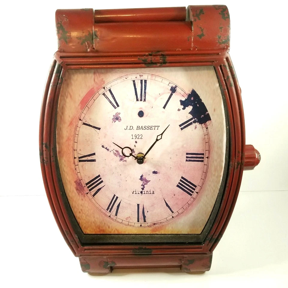 Reloj de mesa de 16" de metal rústico inspirado en números romanos JD Bassett Foto 1 de 4