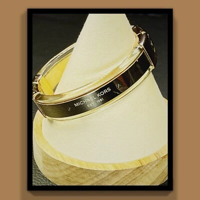 BRAZALETE BRAZALETE MICHAEL KORS TONO DORADO + ACETATO ACRÍLICO TRANSPARENTE  Foto 1 de 4