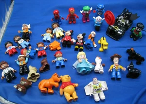 34 Lego DUPLO MINIFIGURES Batman, Disney Joker Animals, Frozen, vehicles, people - Picture 1 of 13
