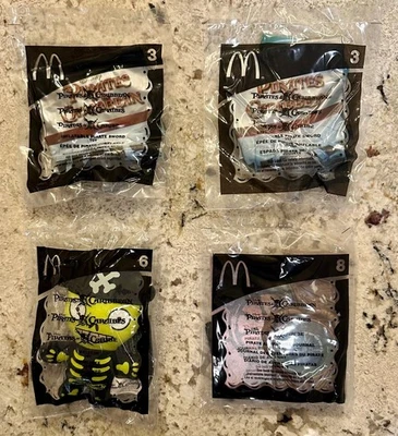 McDonald's 2006 Pirates of the Caribbean - Lot of Four (Two 3s, 6, 8) - NEW - Image 1 of 2