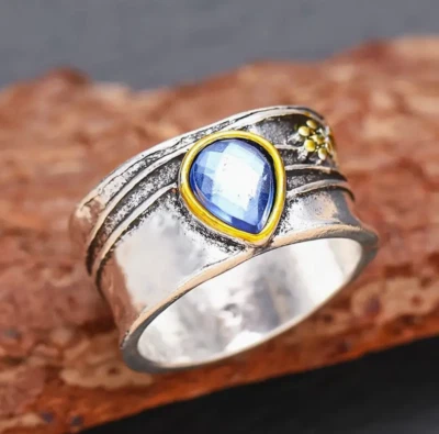 Hecho a mano enchapado en plata con piedra de acento azul lágrima Foto 1 de 3