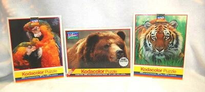 Jigsaw Puzzles Kodacolor Cuddling Macaws, Grizzly Bear & Tiger  Lot of 3  S9388 - Image 1 of 4
