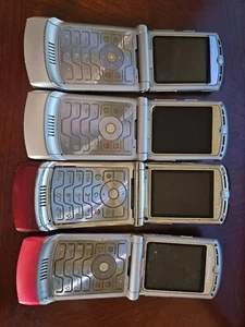 Four used Motorola Razr phones - 2 silver, 2 red - all worked before replaced - Picture 1 of 2