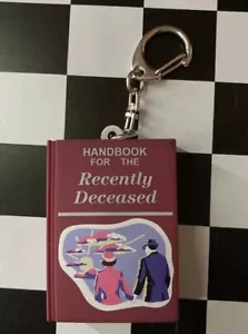 Horror Mystery Bag Clip Beetlejuice Recently Deceased Handbook - Picture 1 of 8