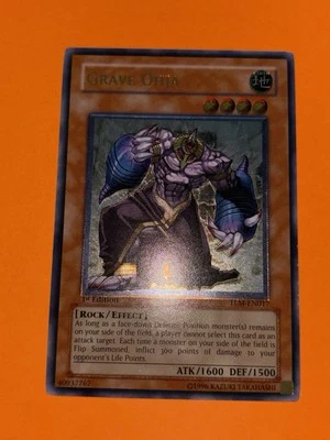 YuGiOh MISPRINT Grave Ohja TLM-EN017 Ultimate Rare 1st Ed FOIL SHIFT Near Mint - Image 1 of 4