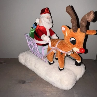 Gemmy Rudolph El Reno Nariz Roja Papá Noel Juguetes Inadaptados Trineo Musical Animado Foto 1 de 4