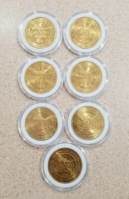 1994 Uncirculated Grand Casino 7 Wonders Series Tokens Complete Collectors Set - Image 1 of 4