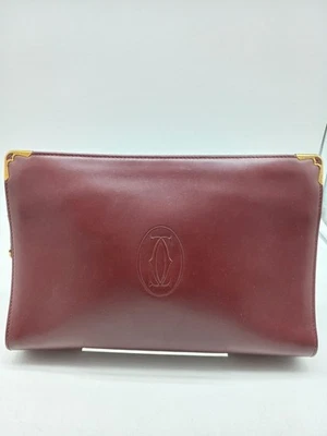 Auténtico bolso de mano Must de Cartier bolso sin asas de negocios burdeos rojo dorado logotipo 2C Foto 1 de 4