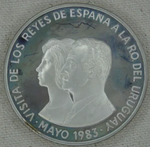 1983 Uruguay 2000 Nuevo Peso Silver Proof Royal Visit Spain King & Queen - Picture 1 of 4