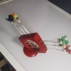 6 Cocktailspieße mit Vogelmotiven in futurist. Kunststoff-Ständer,50er/60er Jahr - Bild 1 von 5