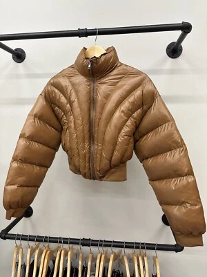 chaqueta puffer marrón mujer Foto 1 de 3