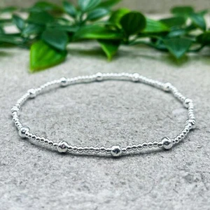 Sterling silver plain stacking stretch bracelet with small textured round beads - Picture 1 of 5