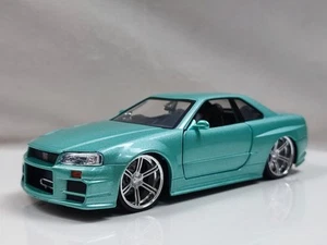 Jada 1/24 2002 Nissan Skyline R34 Gtr Mint Green Sport Car Model - Picture 1 of 10