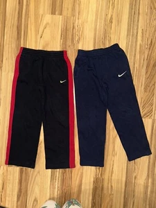 Nike Jungen Jogginghose Gr. 7 Baumwolle dunkelblau schwarz rot weites Bein Y2K dicke Taschen - Bild 1 von 9