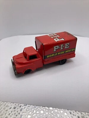 CAMIÓN DE JUGUETE DE FRICCIÓN LITOGRÁFICA DE HOJALATA DE COLECCIÓN P.I.E WORLD WIDE MOVERS 4" LARGO HECHO EN JAPÓN Foto 1 de 4