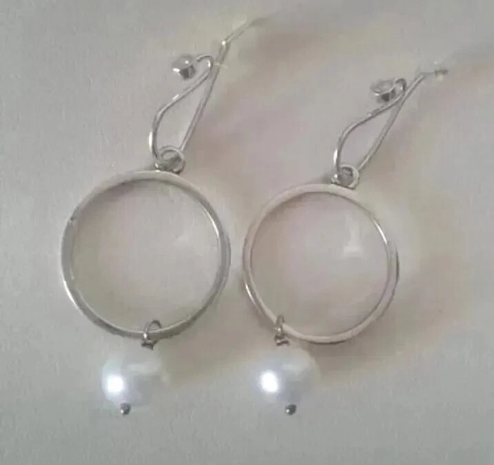 Orecchini pandora fuori produzione originali..perla D Acqua Marina - Immagine 1 di 3