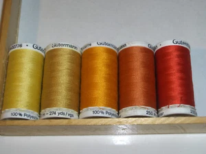 LOTTO 5 SPOLE DA 250 MT GUTERMANN GIALLO ROSSO NUOVO FONDO MAGAZZINO MERCERIA - Foto 1 di 2